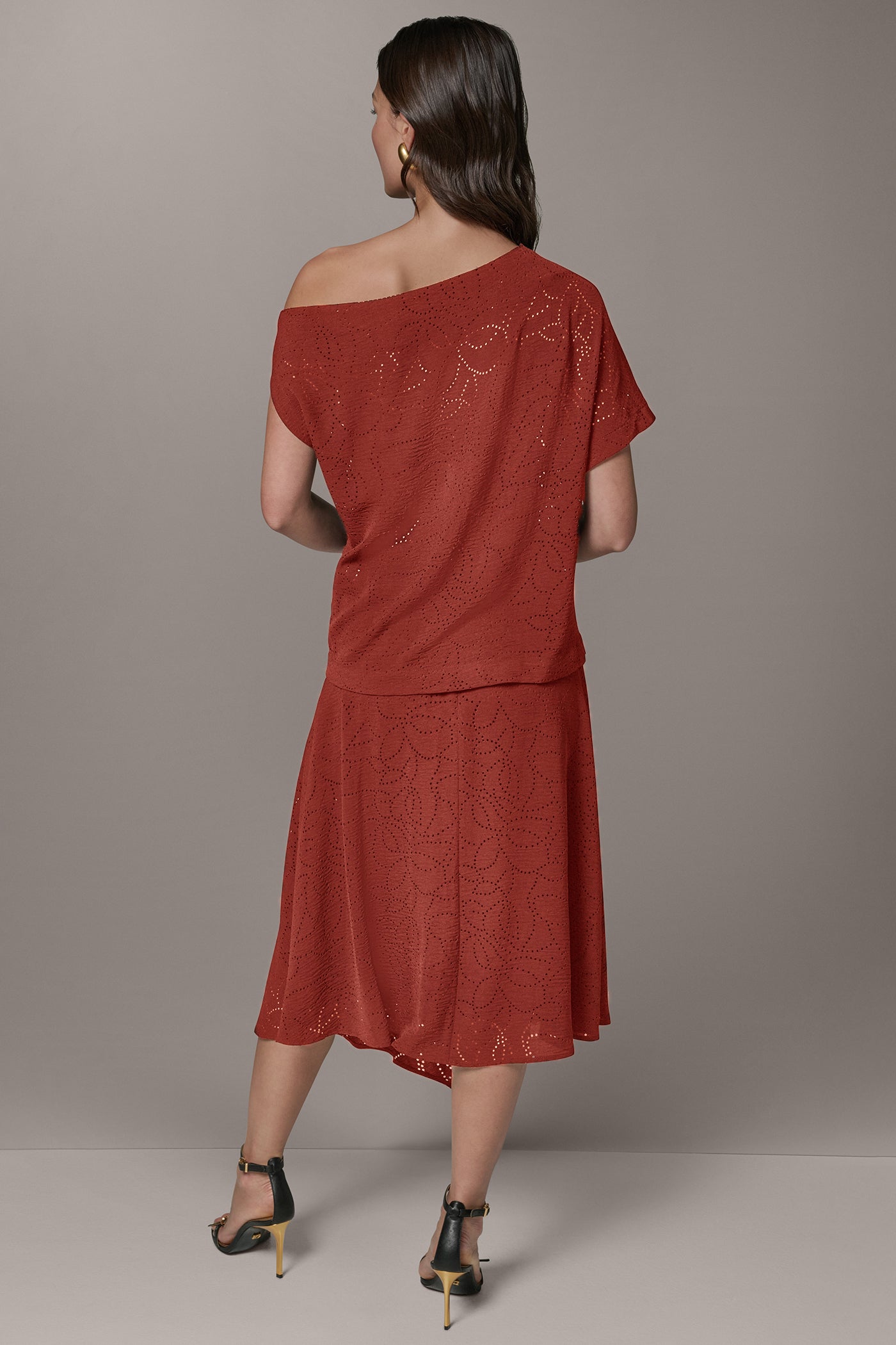 LASER CUT ASYMMETRIC MIDI SKIRT
