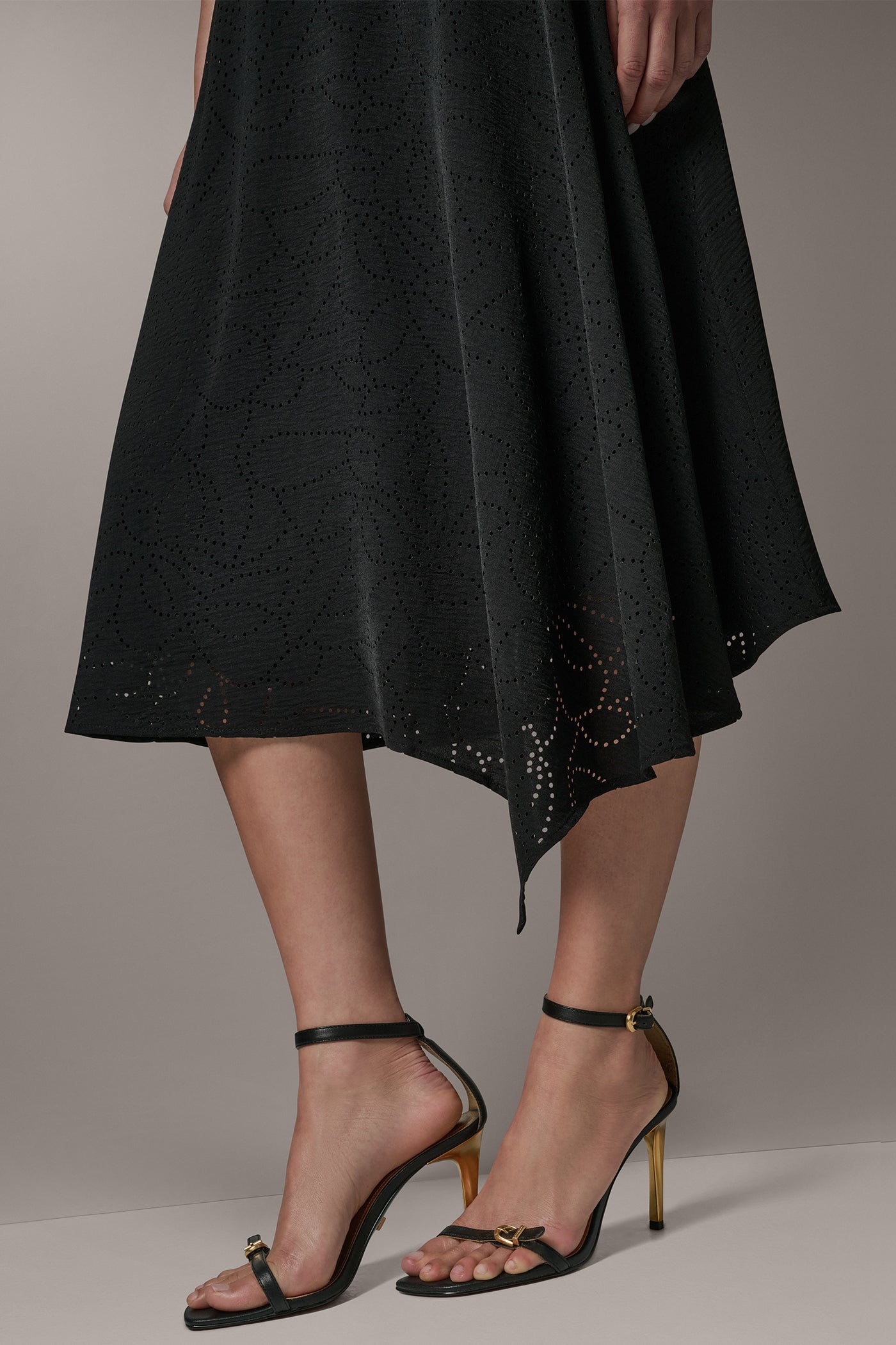LASER CUT ASYMMETRIC MIDI SKIRT