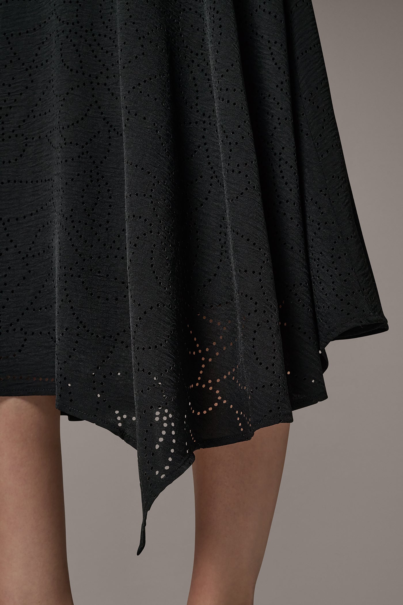 LASER CUT ASYMMETRIC MIDI SKIRT