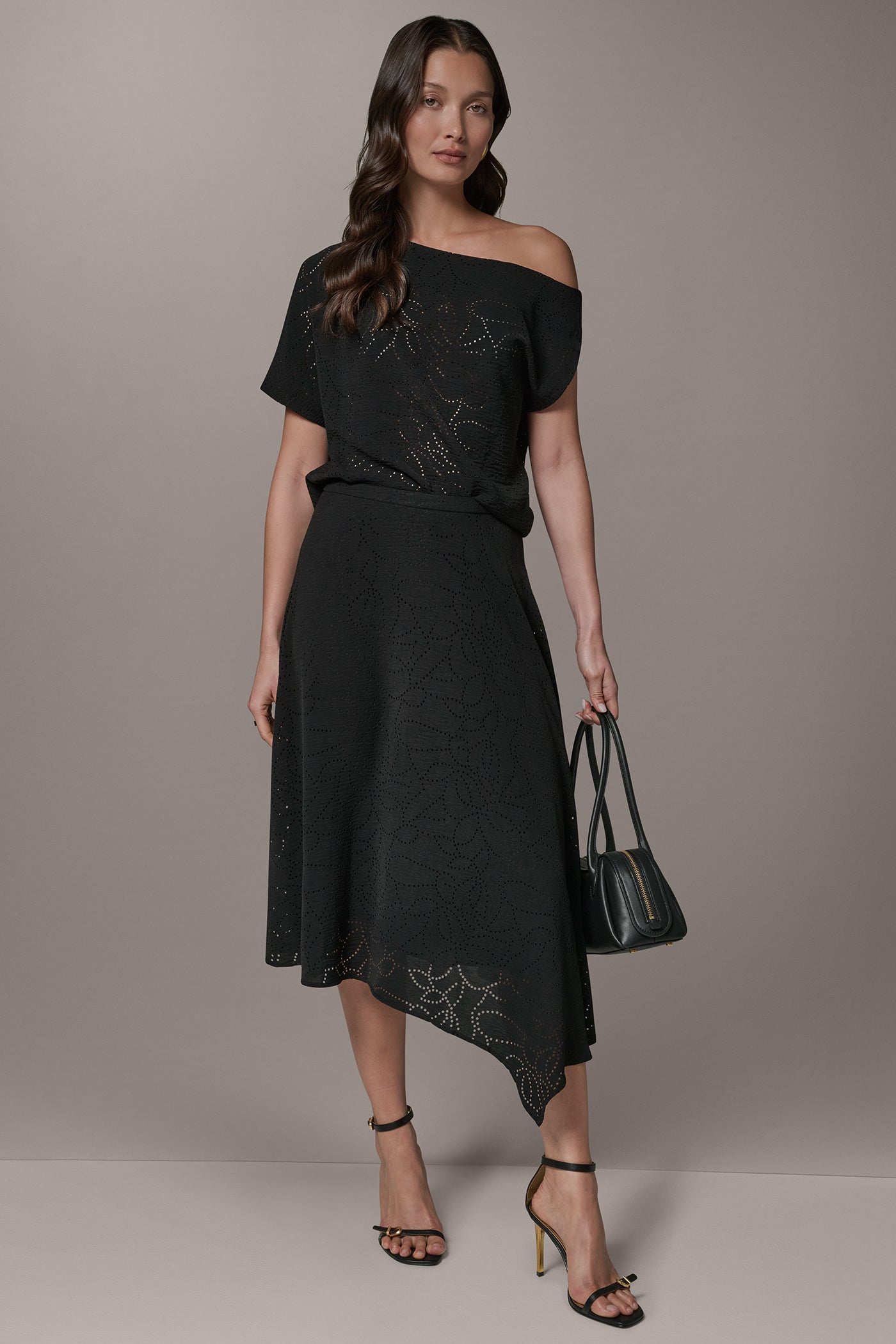 LASER CUT ASYMMETRIC MIDI SKIRT