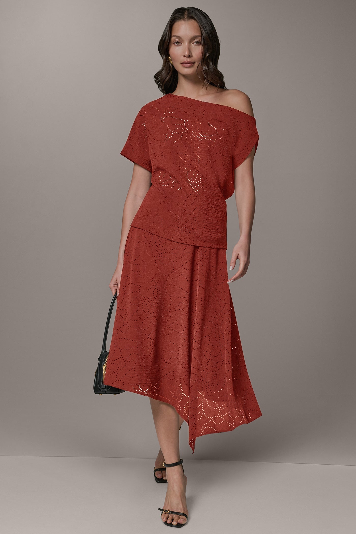 LASER CUT ASYMMETRIC MIDI SKIRT