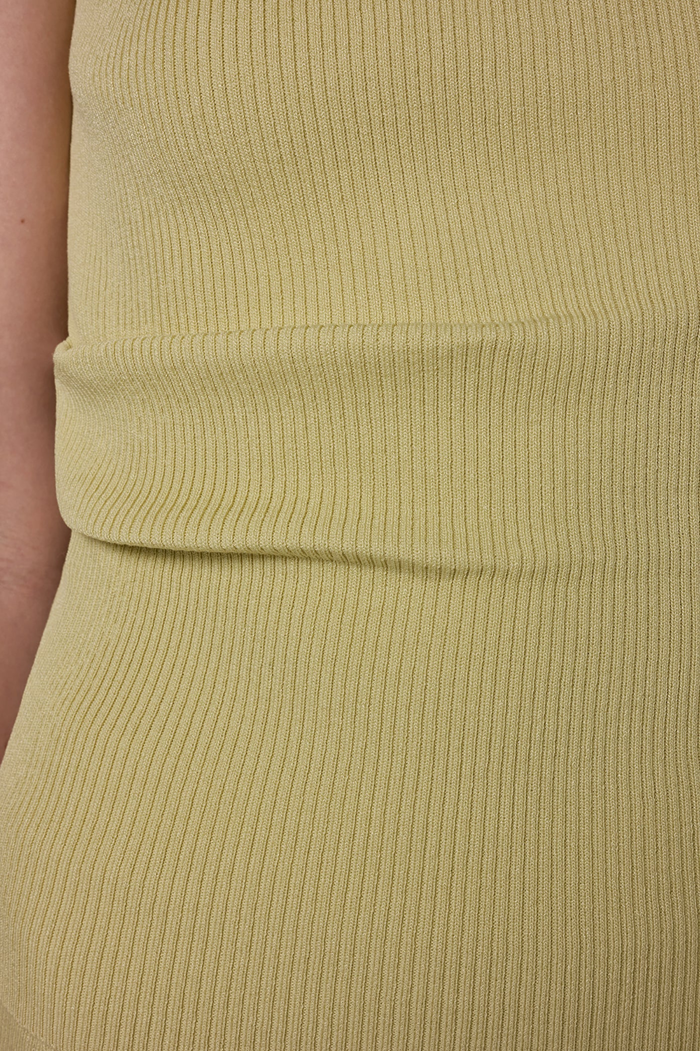 SLEEVELESS ASYMMETRIC BOATNECK SWEATER